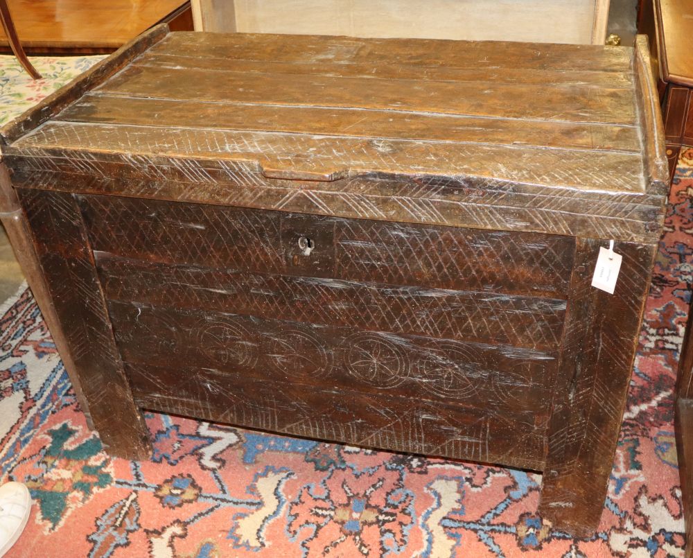 A Spanish walnut primitive coffer, c.1680, W.105cm, D.59cm, H.76cm